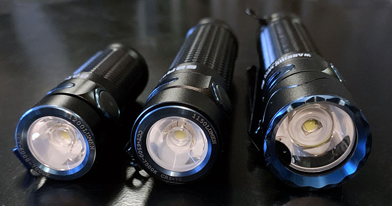 Olight Baton 3, Baton II and Baton Warrior Mini 2 side by side from the front