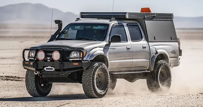 Overland Toyota Tacoma in the desert, a compact and reliable bug out vehicle for tight terrain