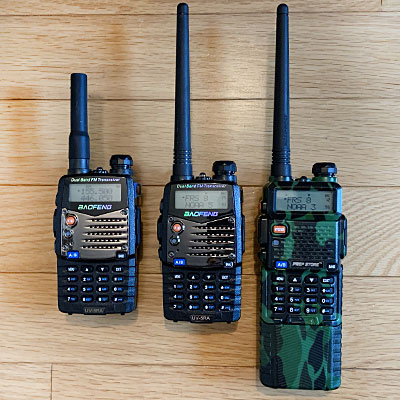 Different models types of Baofeng UV-5R radios side by side