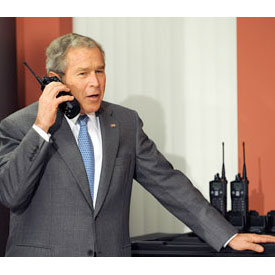 George W. Bush talking on a walkie talkie