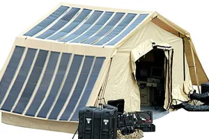 Military tent with solar panels along the roof