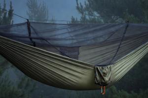 COCOON Ultralight Mosquito Net Hammock with bug net in a misty pine forest — bug out sleep system review by Mr.BOBB